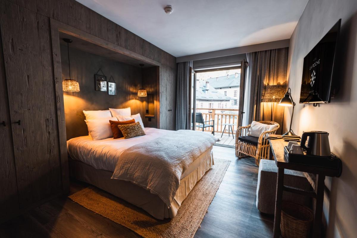 Un ou plusieurs lits dans un hébergement de l'établissement Hôtel de la Roche