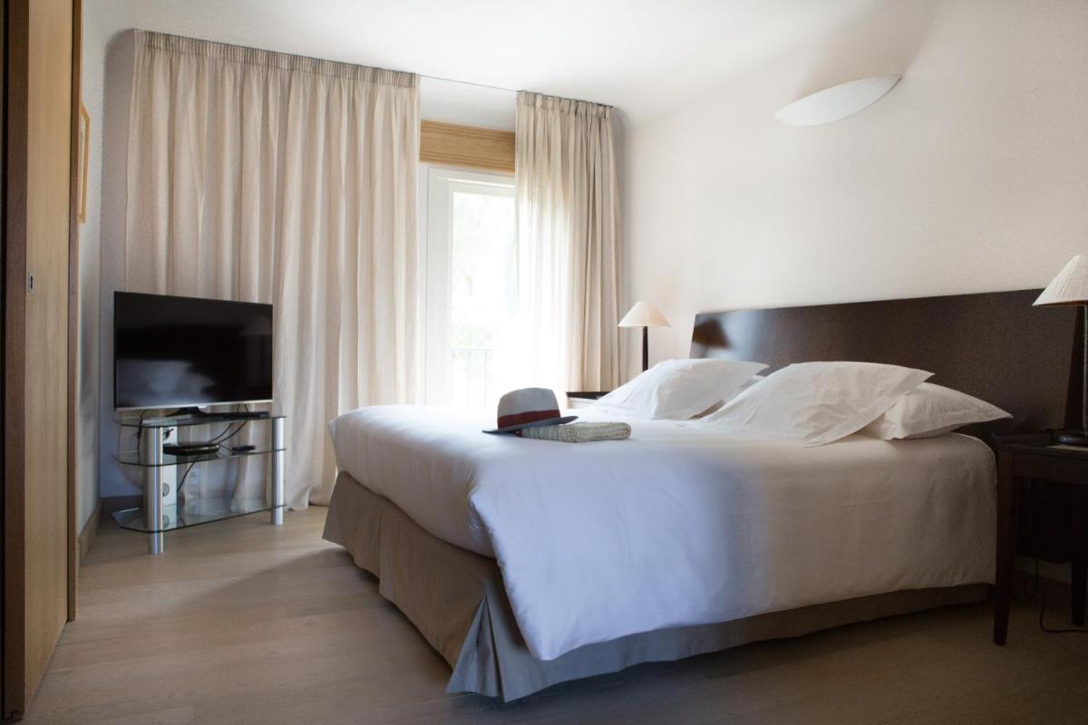Un ou plusieurs lits dans un hébergement de l'établissement La Villa Calvi