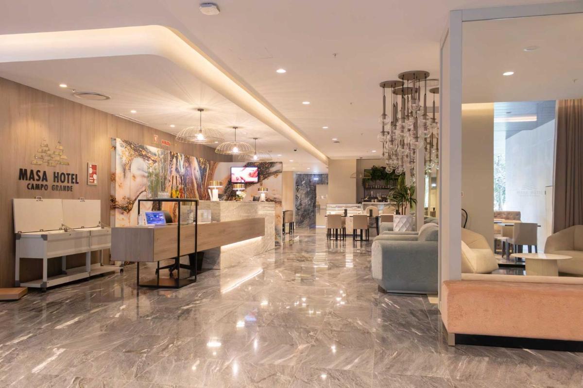 um lobby de uma loja com um salão de cabeleireiro em MASA Hotel & Spa Campo Grande Collection em Lisboa mais 38 fotografias