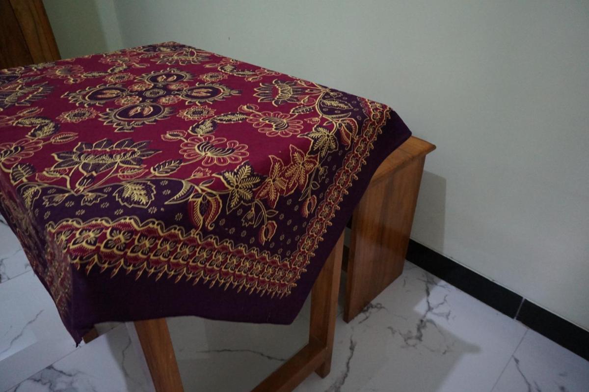 OYO 93784 Kost Bu Eli Syariah - Housity