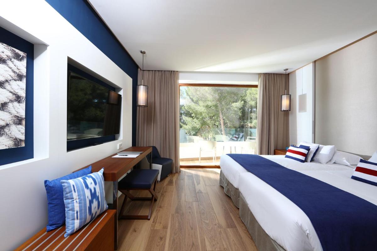 Cama o camas de una habitación en Hotel Son Caliu Spa Oasis