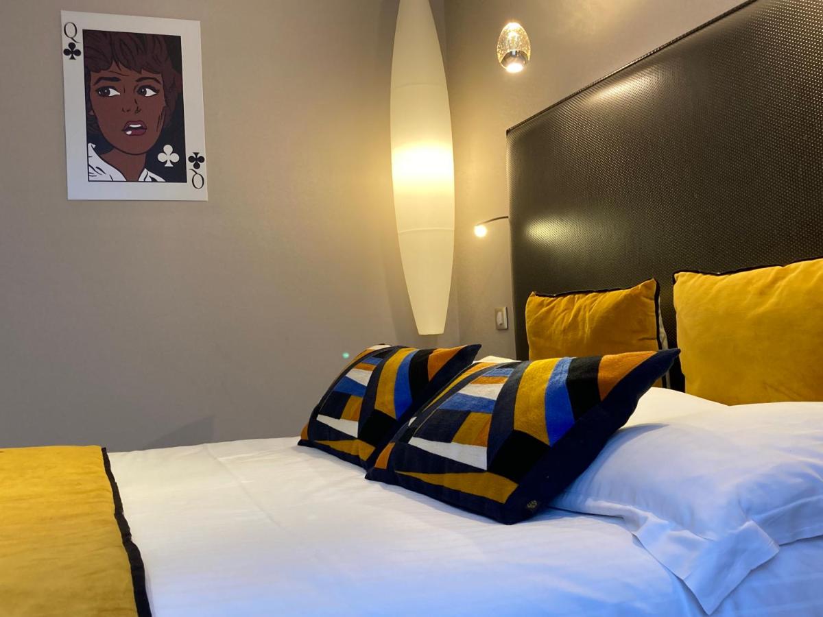 Un ou plusieurs lits dans un hébergement de l'établissement Hôtel des Princes, Chambéry Centre
