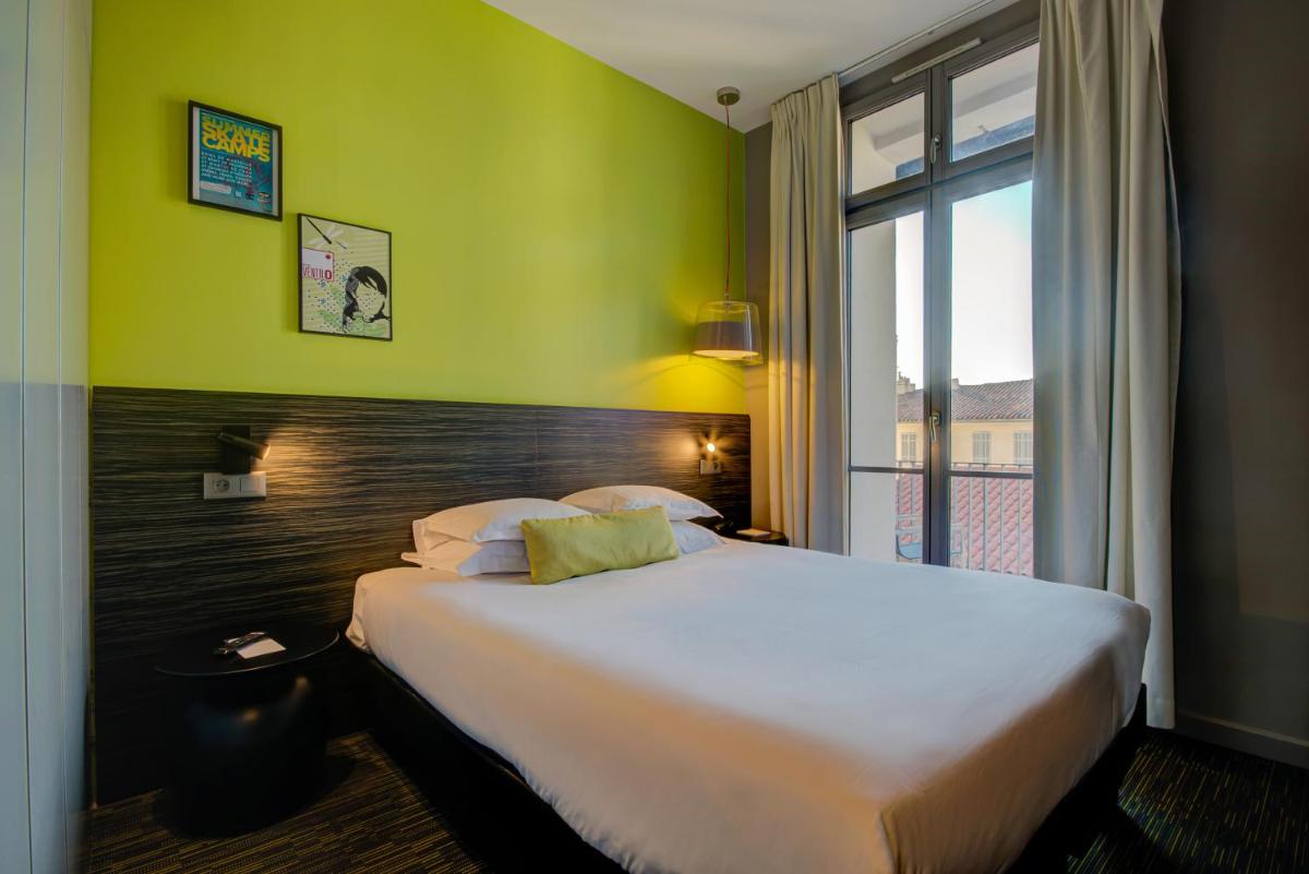 Un ou plusieurs lits dans un hébergement de l'établissement Alex Hotel & Spa
