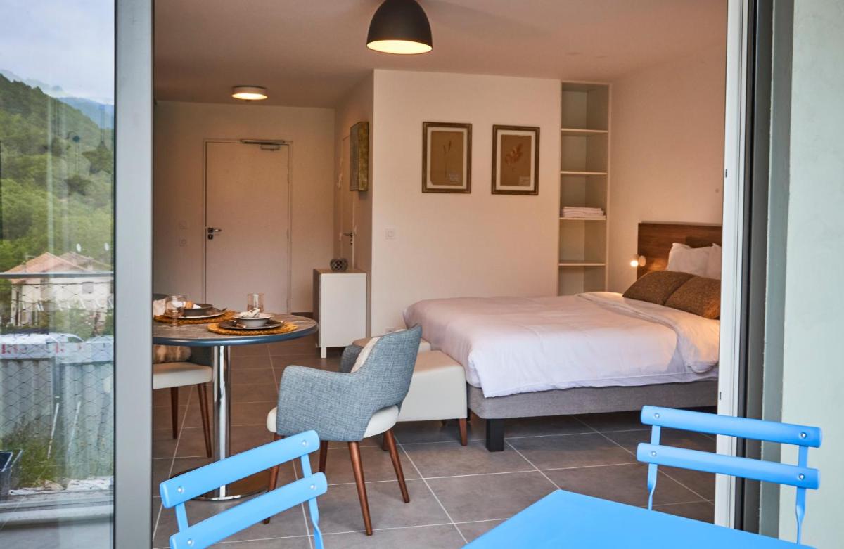 Un ou plusieurs lits dans un hébergement de l'établissement Pure Thermal Residence