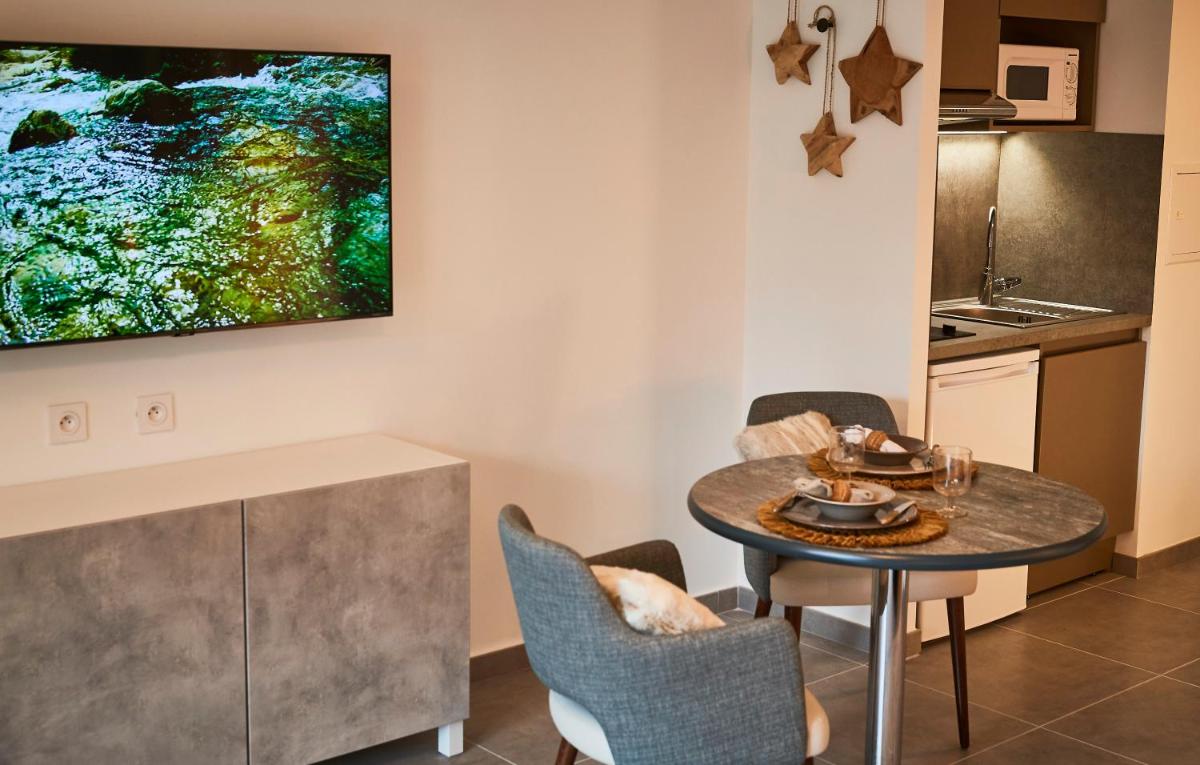 Cuisine ou kitchenette dans l'établissement Pure Thermal Residence