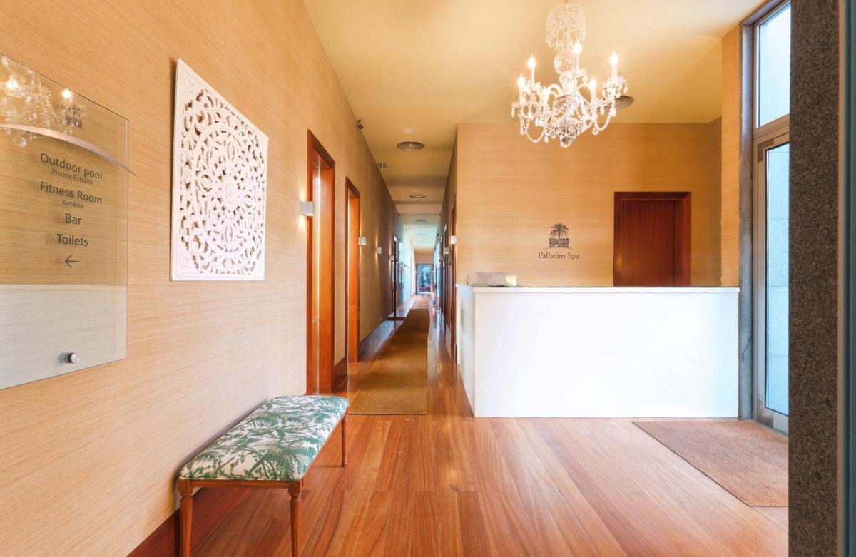 Uma cama ou camas num quarto em Casa Velha do Palheiro Relais & Chateaux