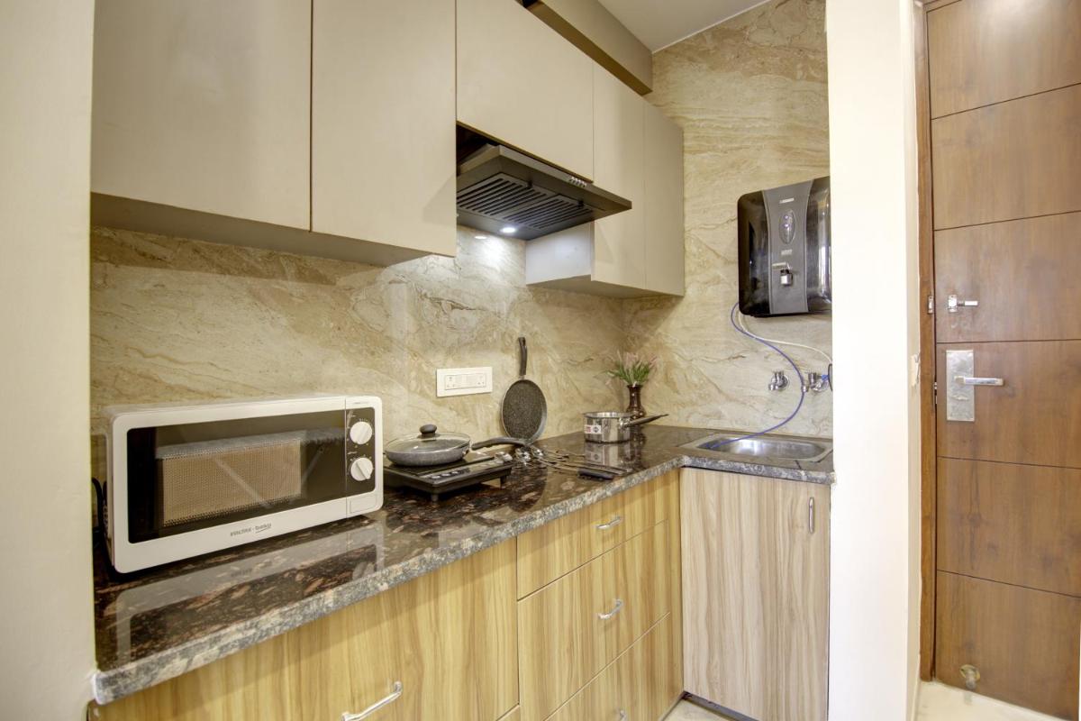 FlxHo Quad - Luxury Studio Apart Hotel DLF Cyber City - Housity