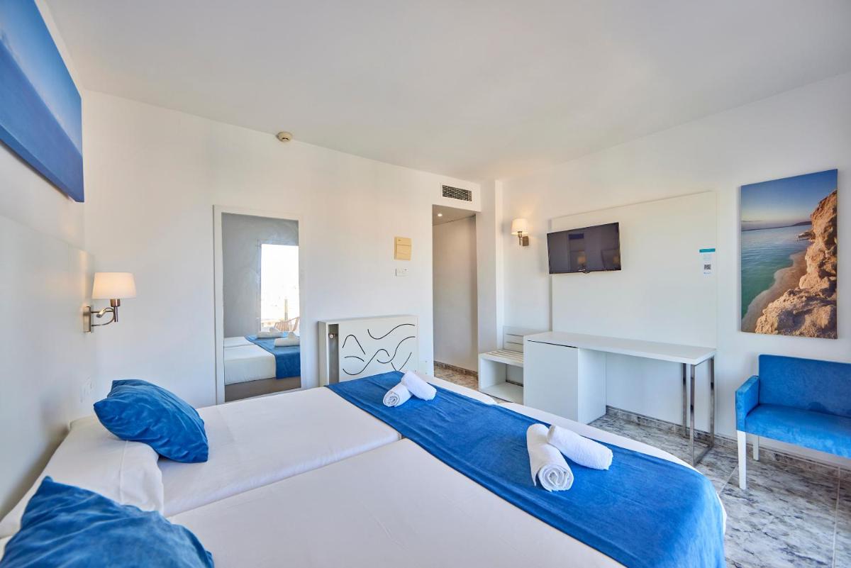 Cama o camas de una habitación en Hotel Ilusion Calma & Spa