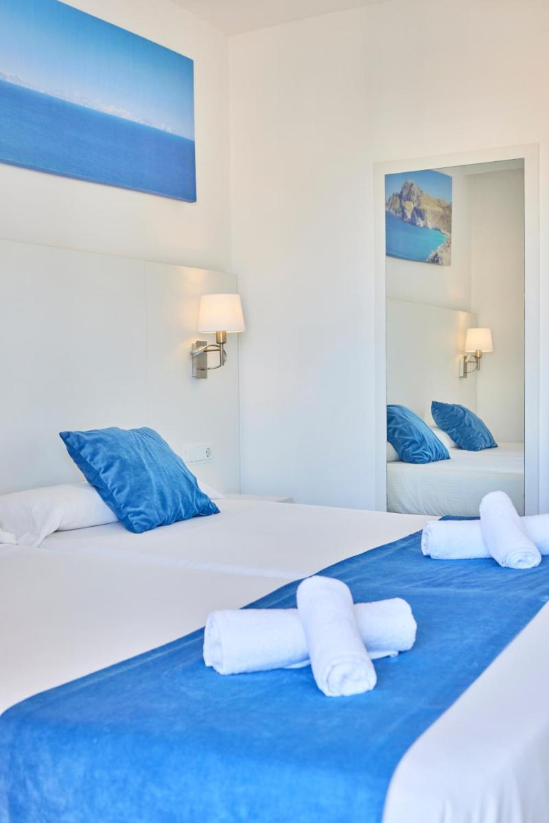 Cama o camas de una habitación en Hotel Ilusion Calma & Spa
