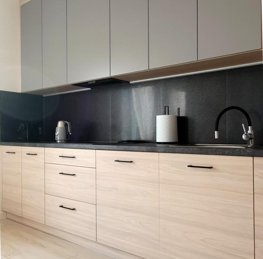 Apartamenty w Sercu Sosnówki - Housity
