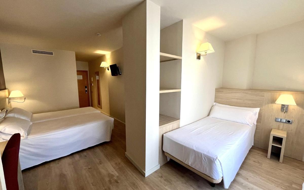 Cama o camas de una habitación en Balneari Termes Victòria