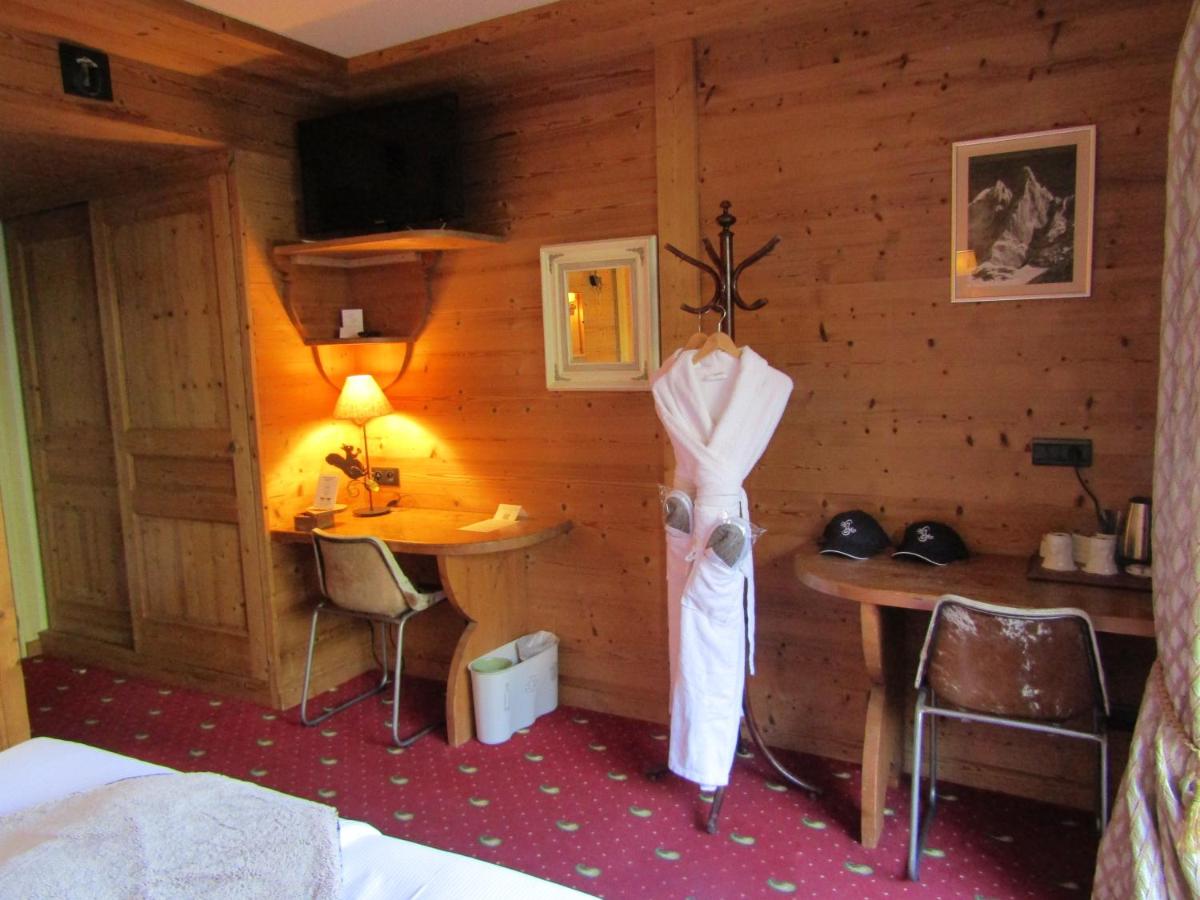 Un ou plusieurs lits dans un hébergement de l'établissement Les Grands Montets Hotel & Spa