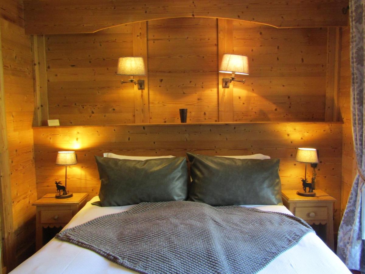 Un ou plusieurs lits dans un hébergement de l'établissement Les Grands Montets Hotel & Spa