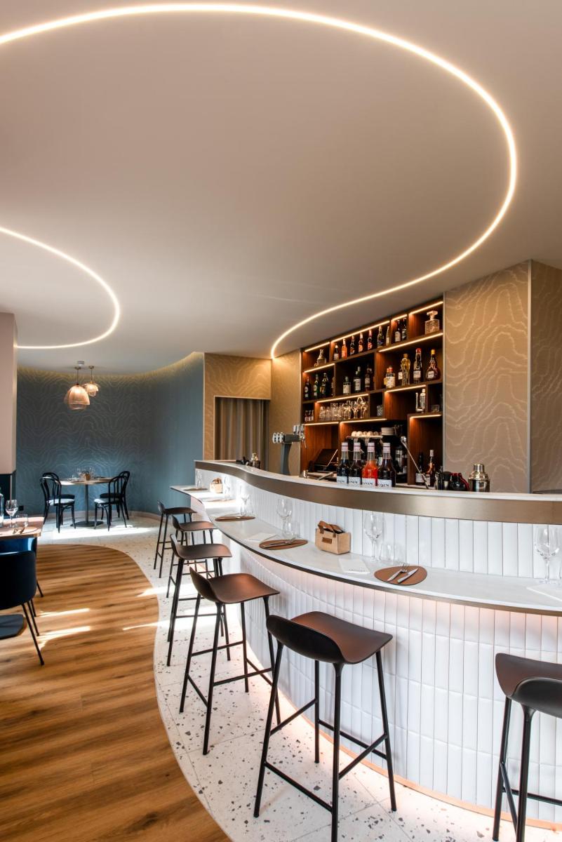 Restaurant ou autre lieu de restauration dans l'établissement La Maison OBONO Hôtel & Spa