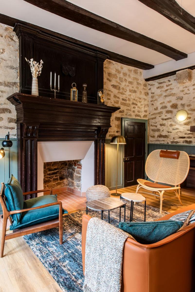 Coin salon dans l'établissement La Maison OBONO Hôtel & Spa