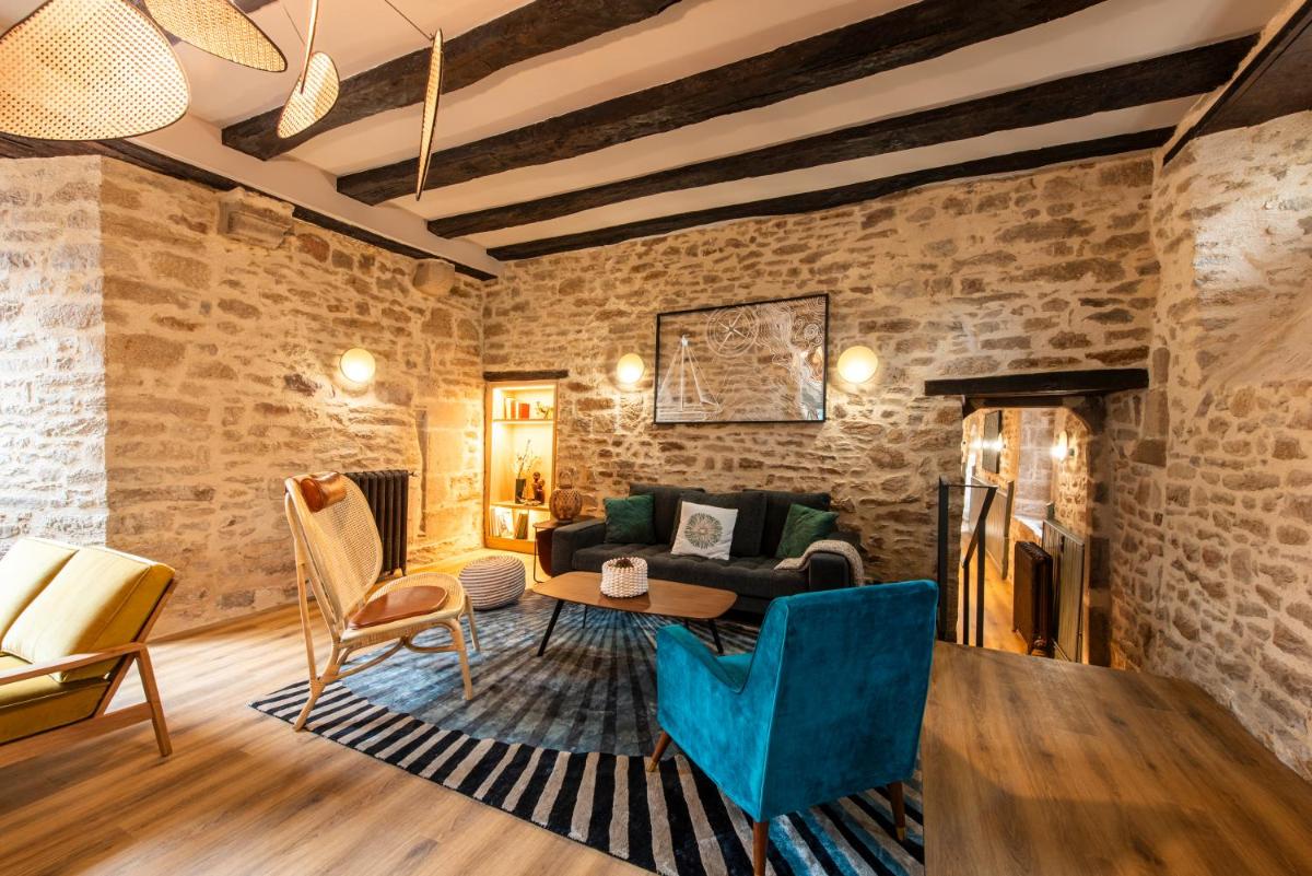Coin salon dans l'établissement La Maison OBONO Hôtel & Spa