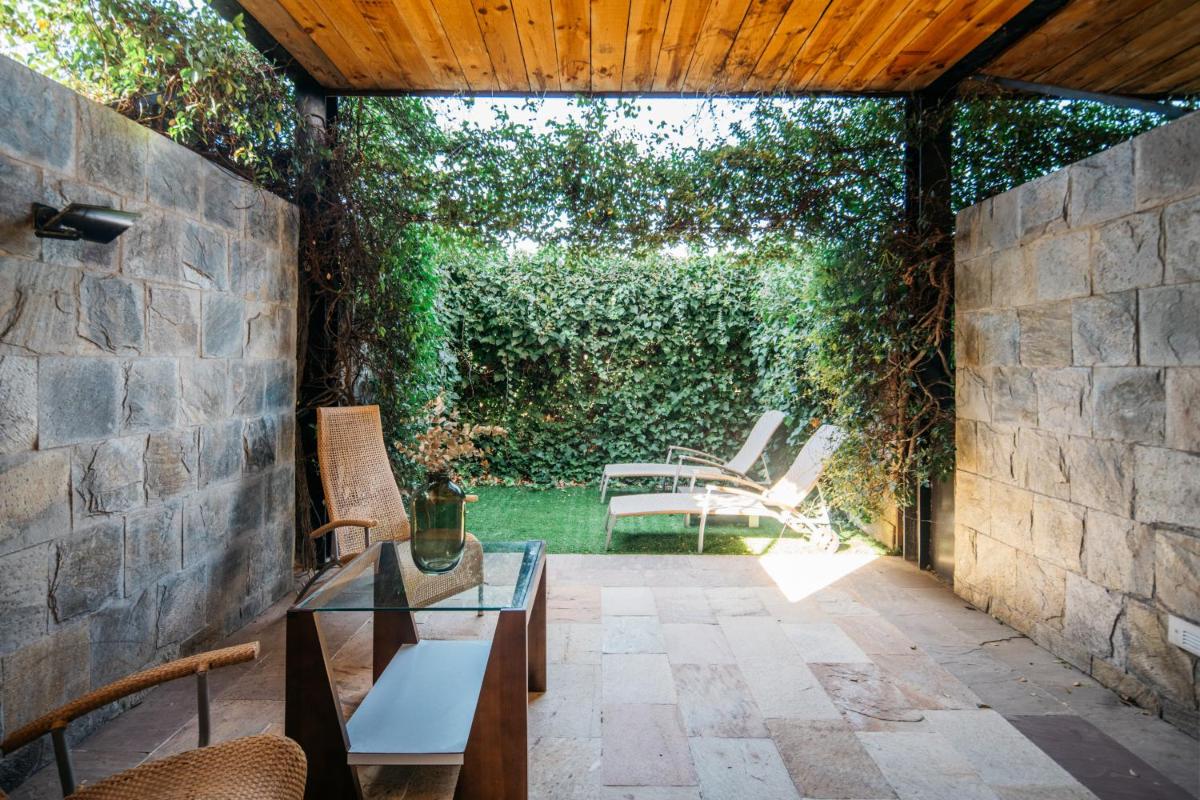 Jardín al aire libre en Hotel Boutique Mas Passamaner