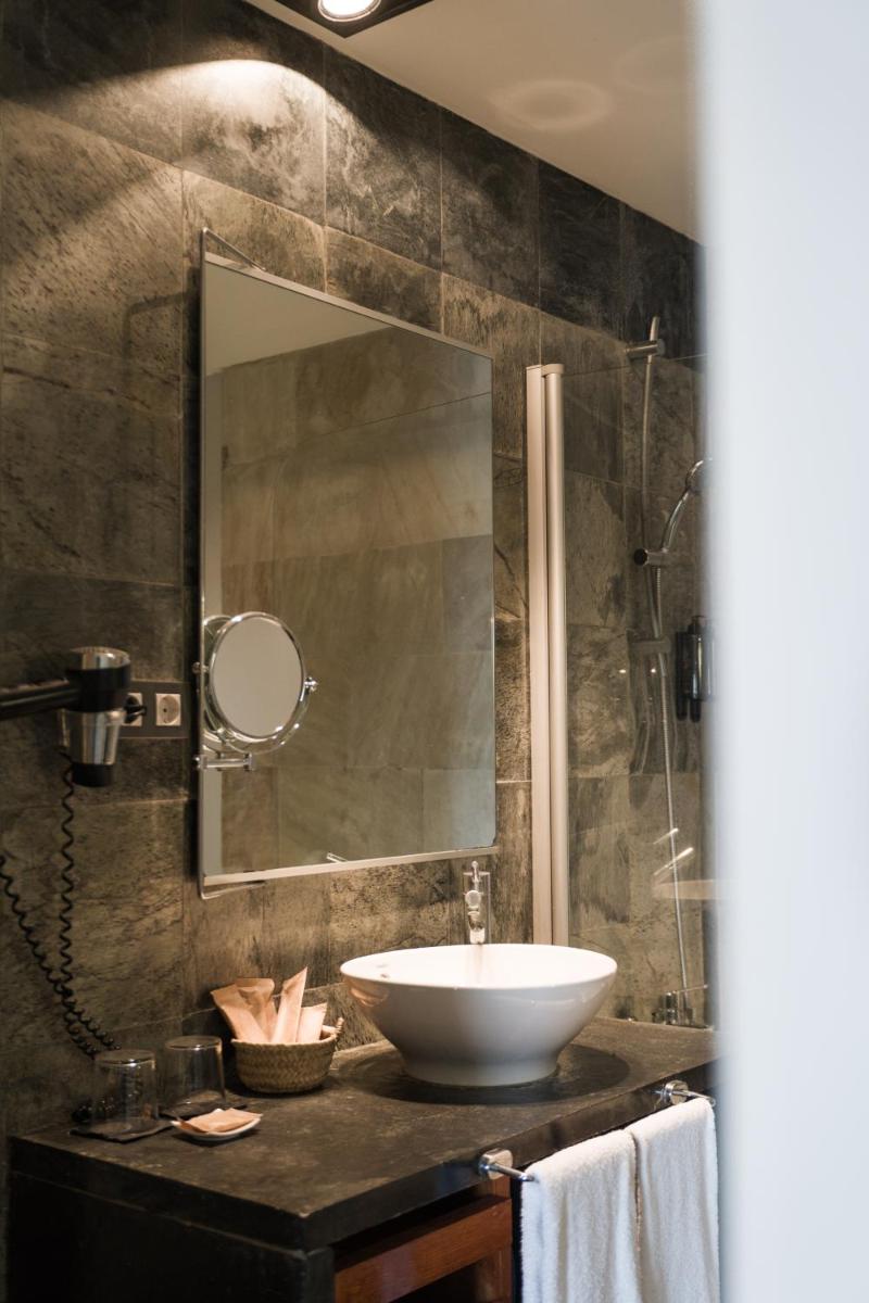 Un baño de Hotel Boutique Mas Passamaner