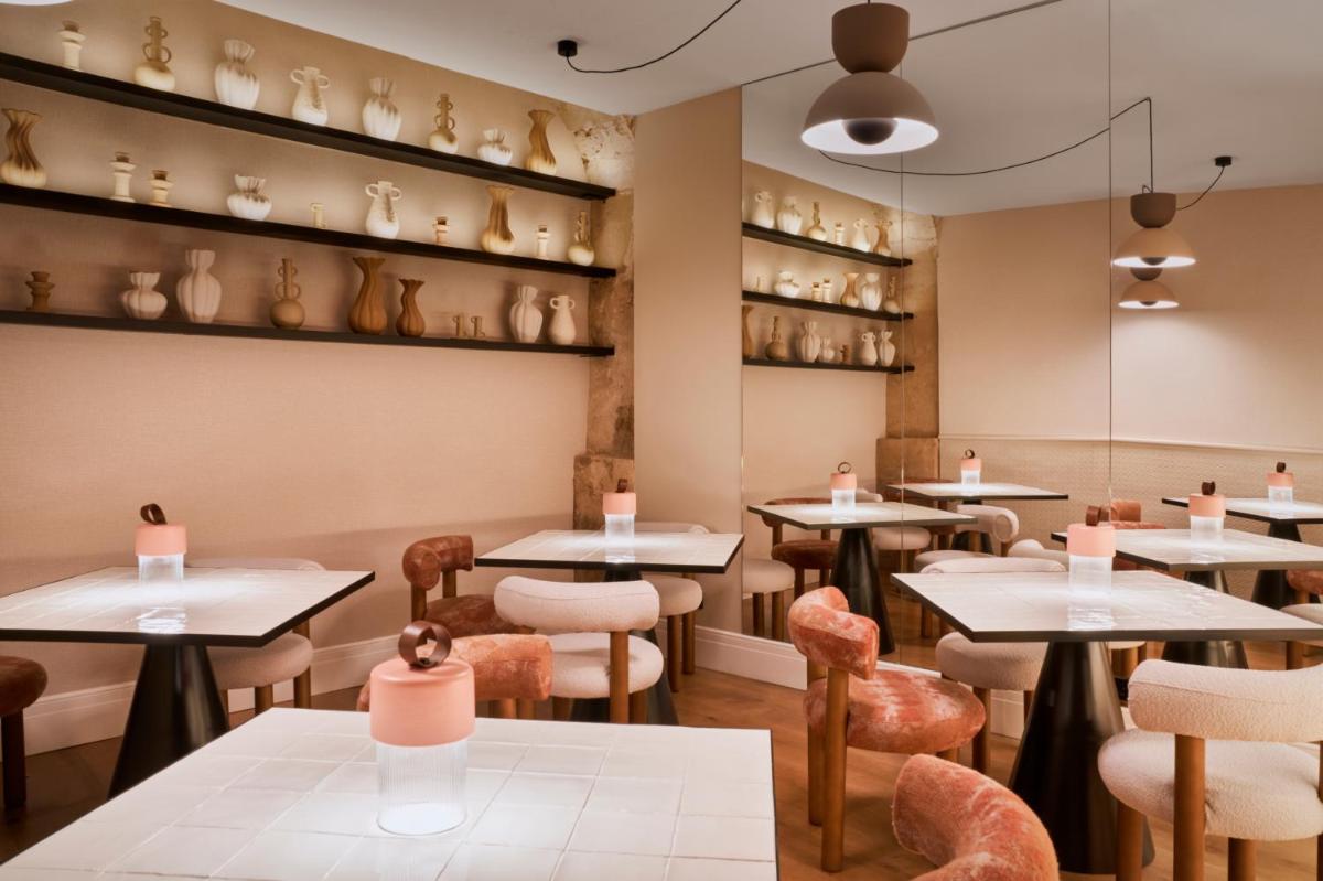 Un restaurante o sitio para comer en Boutique Hotel Posada Terra Santa