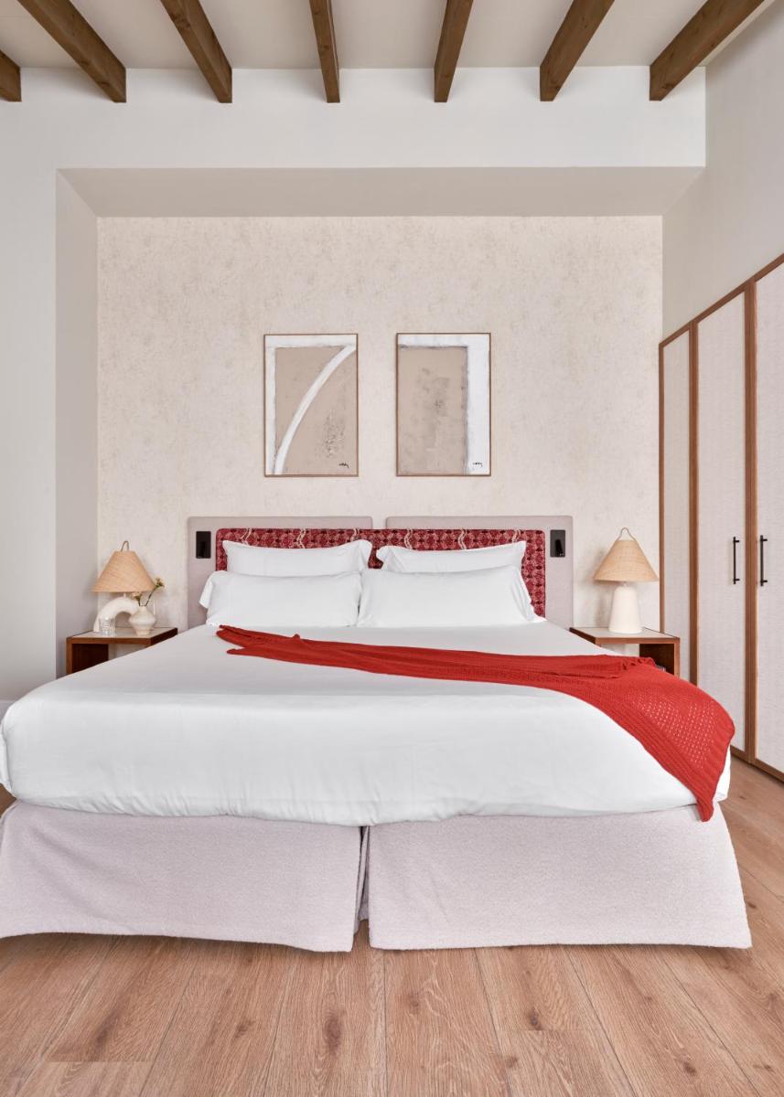 Cama o camas de una habitación en Boutique Hotel Posada Terra Santa