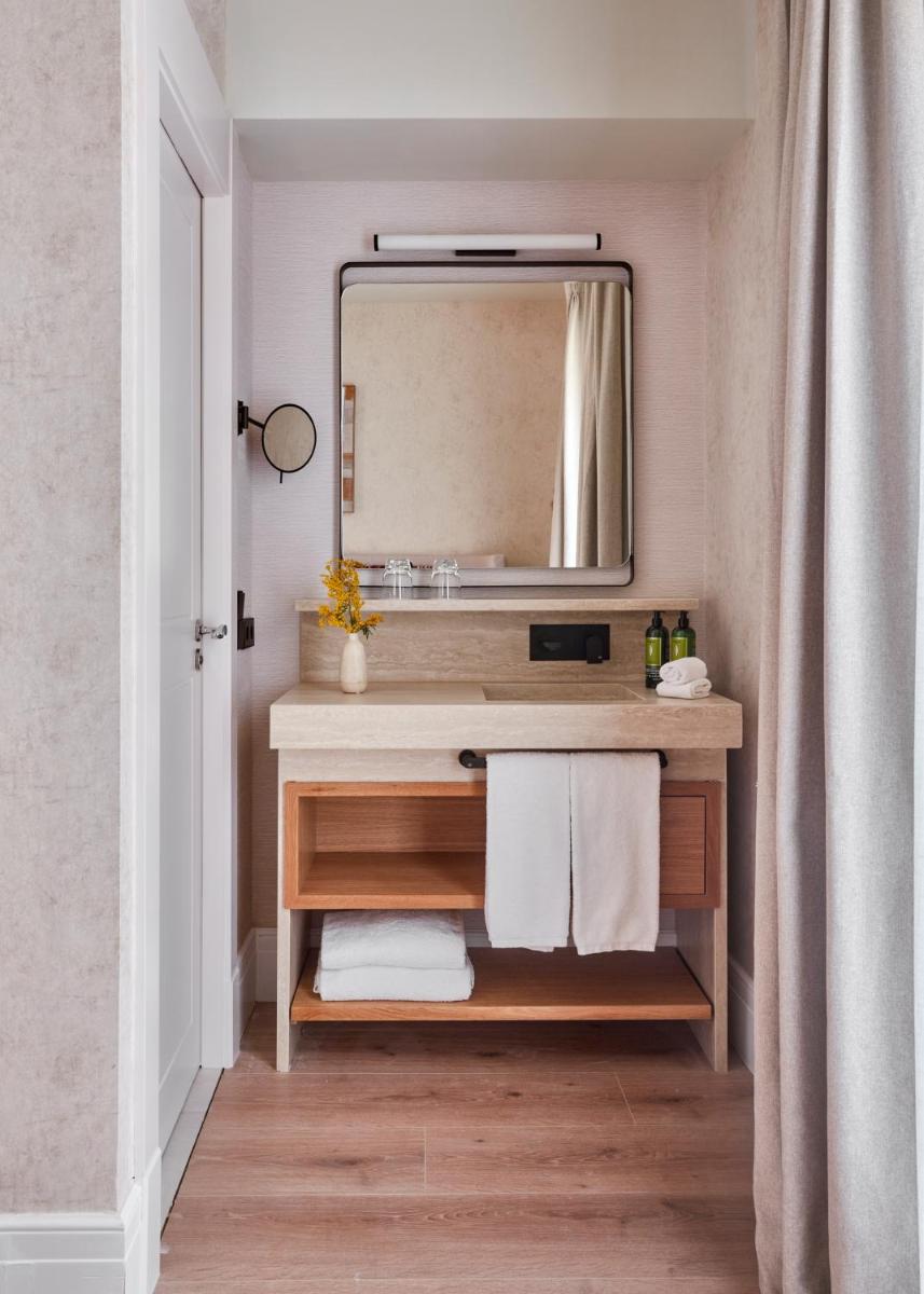 Un baño de Boutique Hotel Posada Terra Santa
