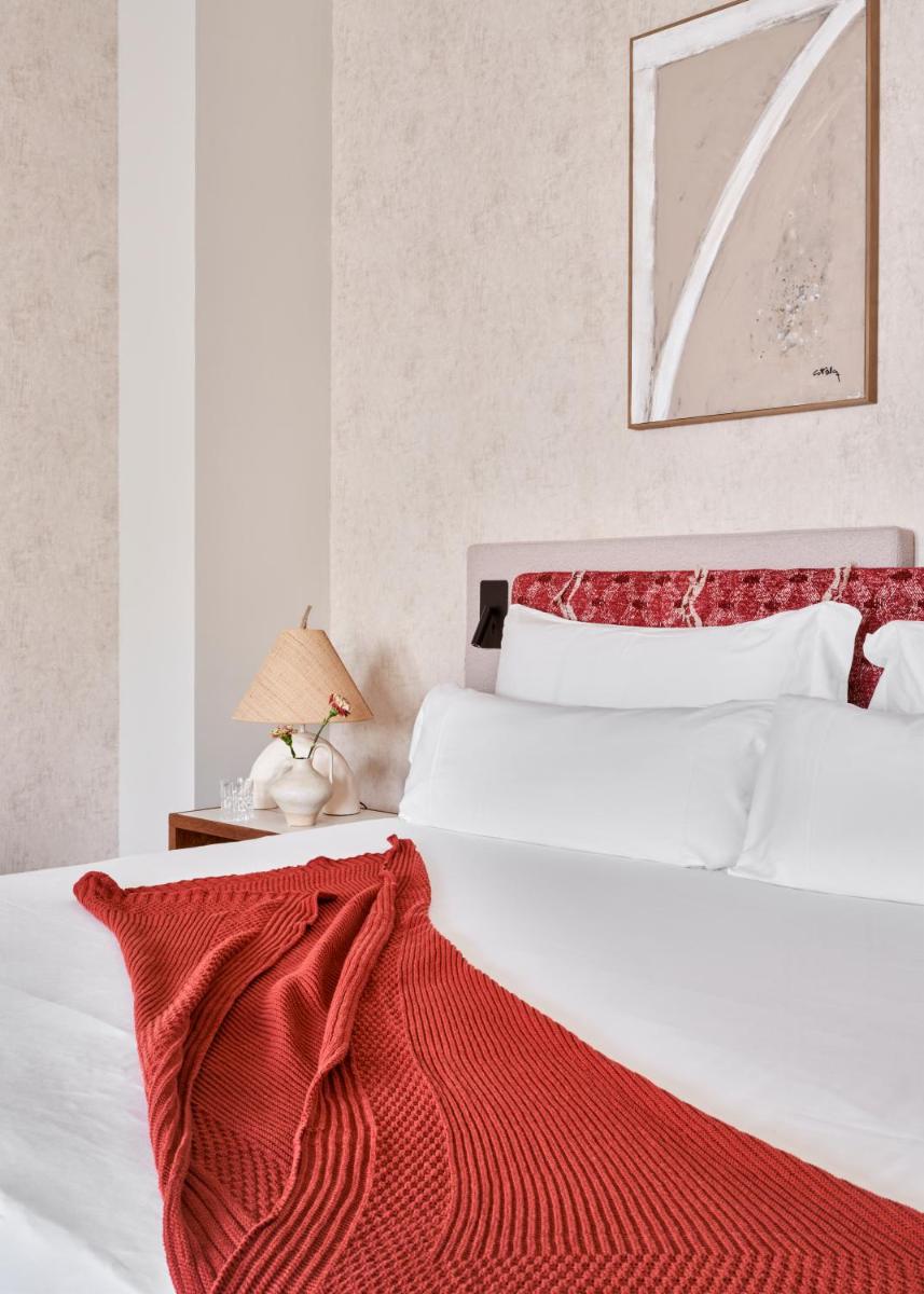 Cama o camas de una habitación en Boutique Hotel Posada Terra Santa