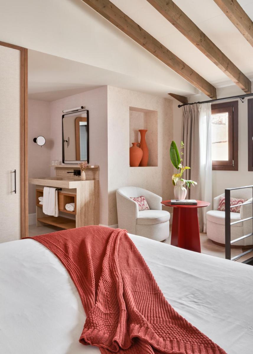 Cama o camas de una habitación en Boutique Hotel Posada Terra Santa
