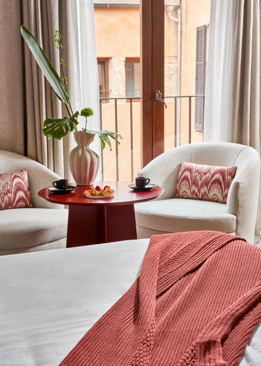Cama o camas de una habitación en Boutique Hotel Posada Terra Santa