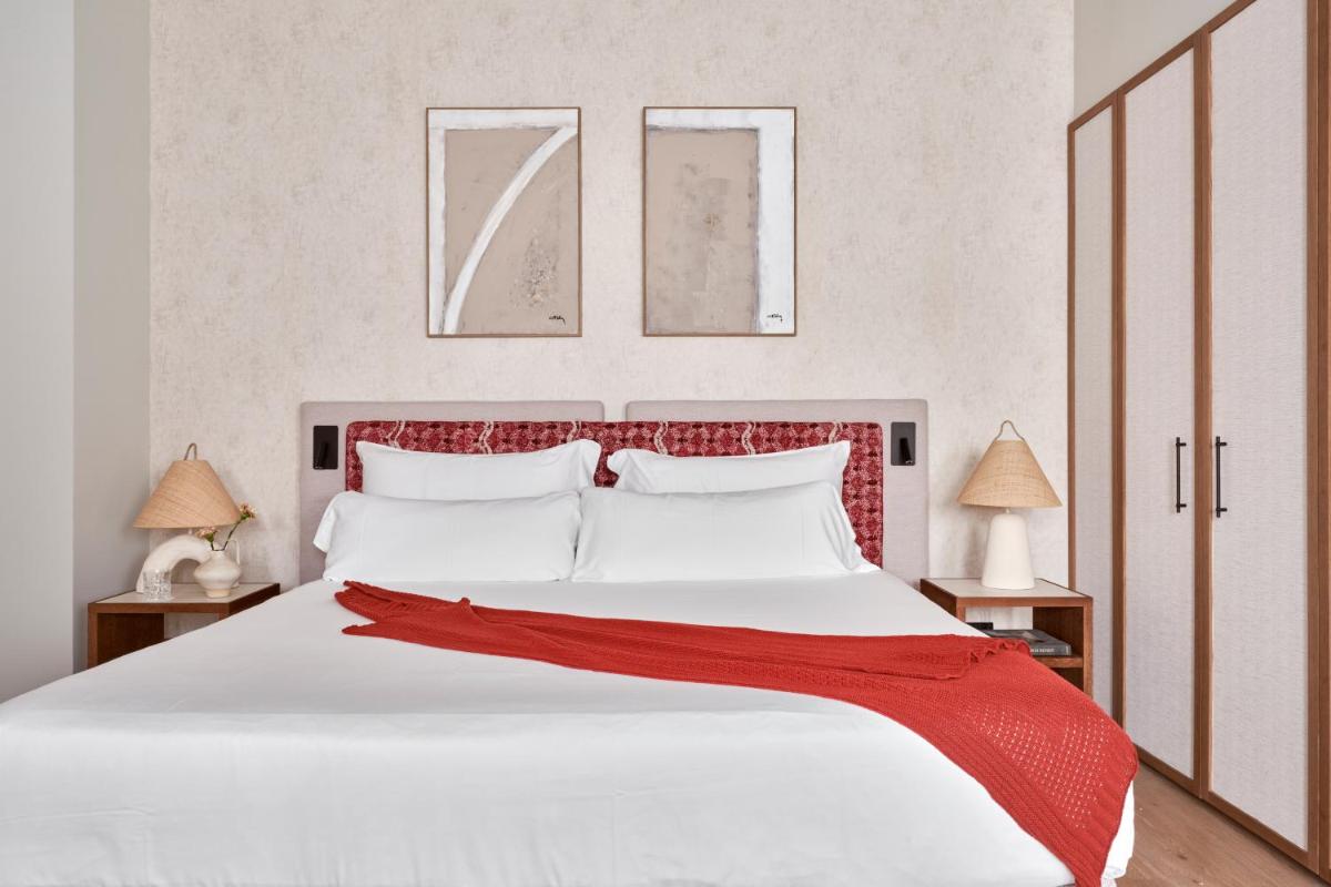 Cama o camas de una habitación en Boutique Hotel Posada Terra Santa