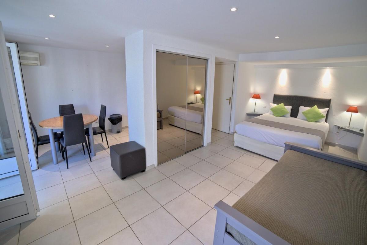 Un ou plusieurs lits dans un hébergement de l'établissement Hôtel Casa Rossa & Spa