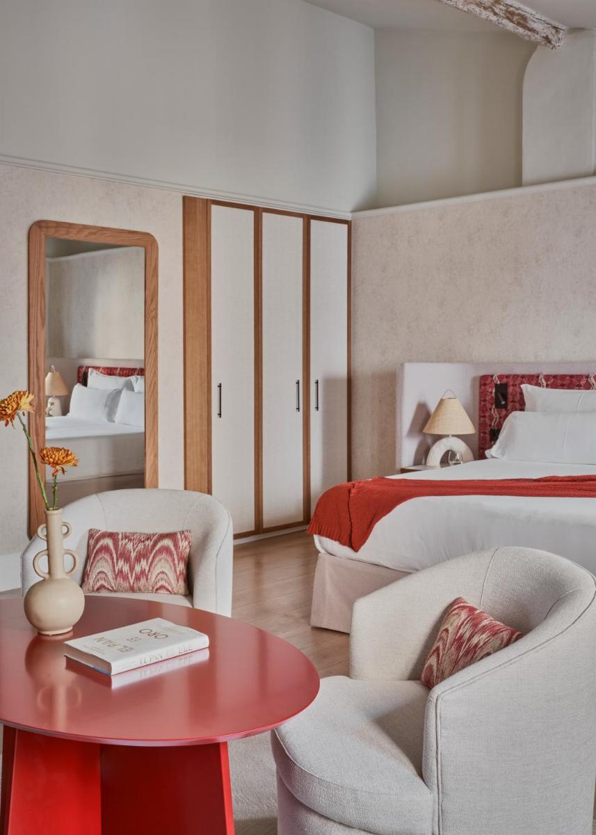 Cama o camas de una habitación en Boutique Hotel Posada Terra Santa