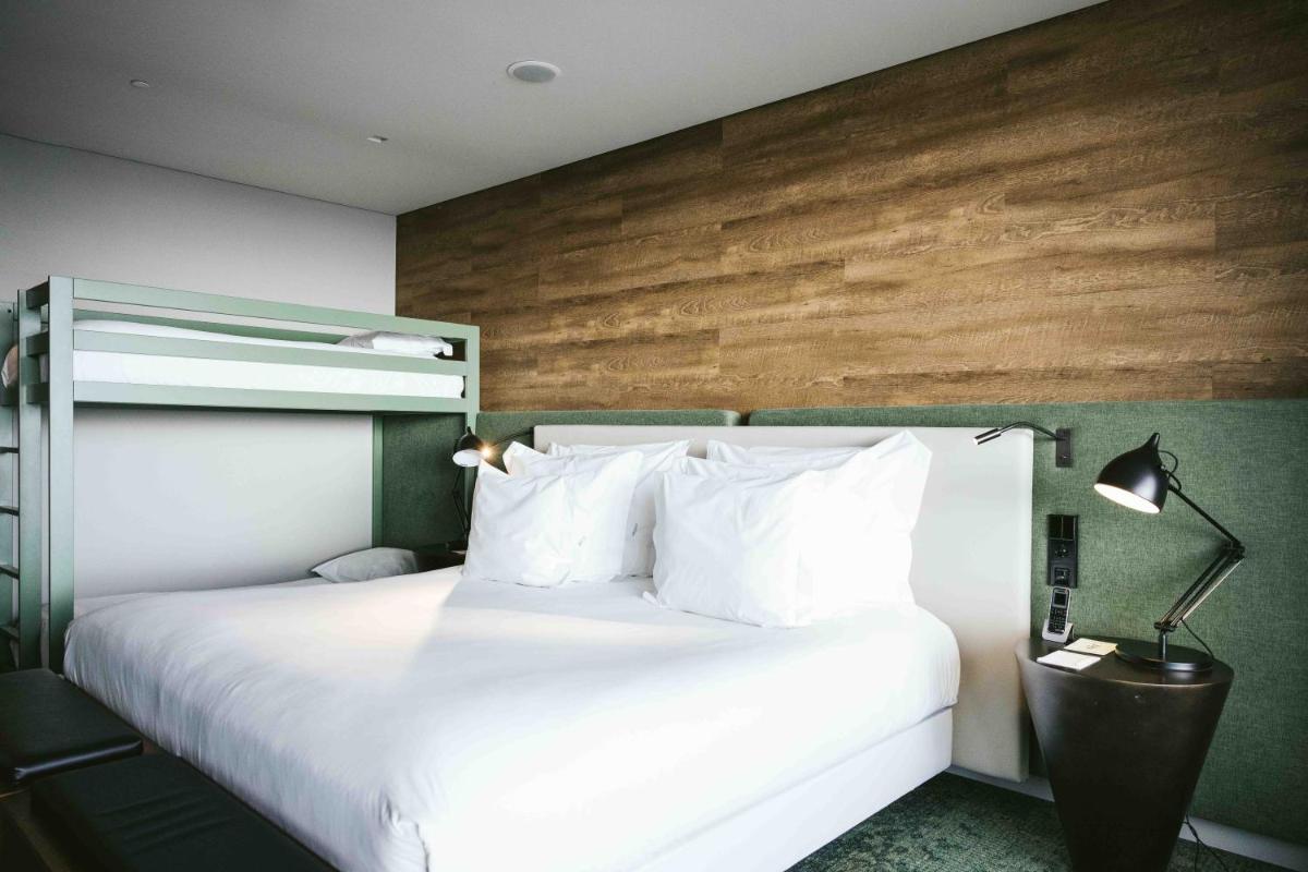 Uma cama ou camas num quarto em Octant Ponta Delgada