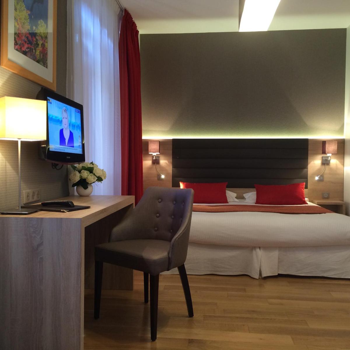Un ou plusieurs lits dans un hébergement de l'établissement Hôtel Lutétia & Spa