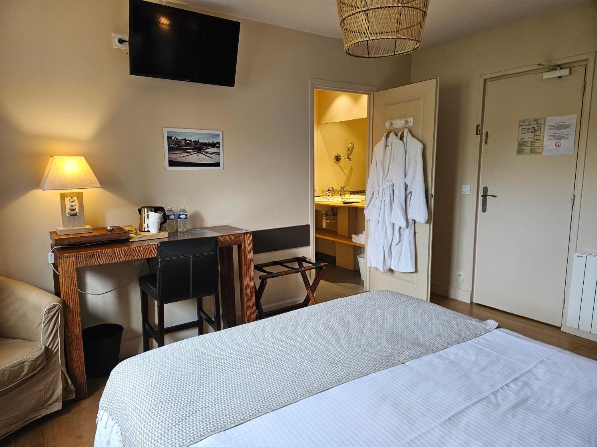 Un ou plusieurs lits dans un hébergement de l'établissement La Fraîchette-Hôtel & Spa