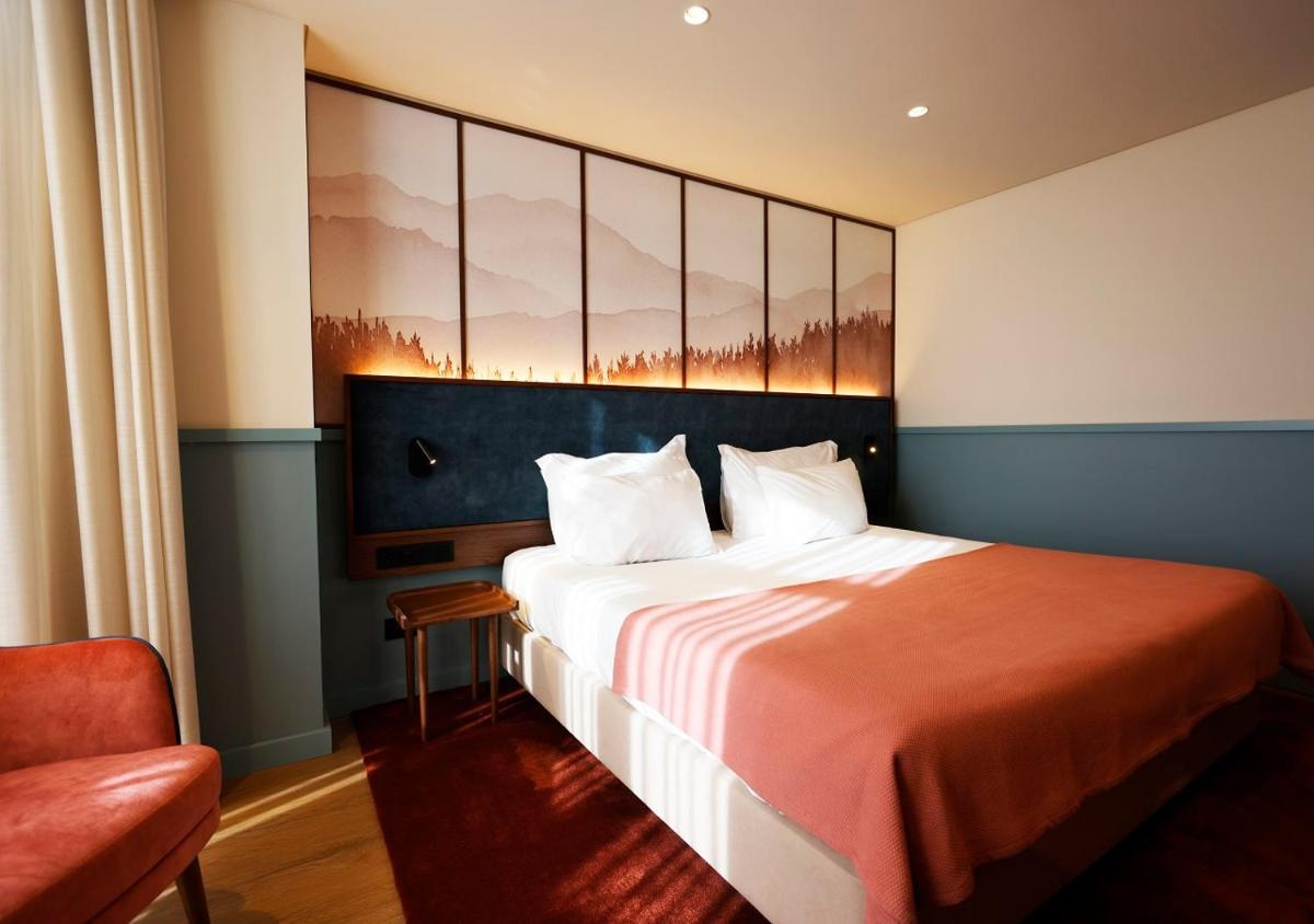 Uma cama ou camas num quarto em Montebelo Viseu Congress Hotel & Spa