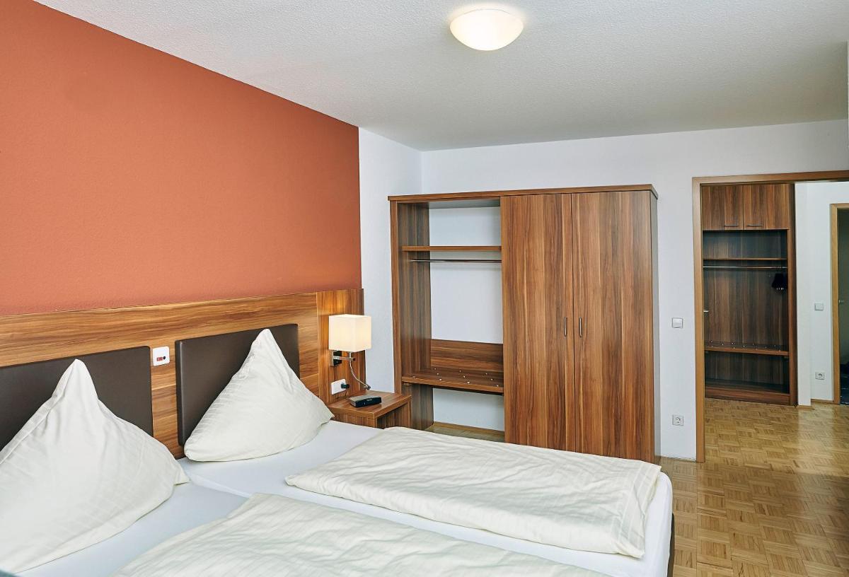 Hotel & Residenz Am Kurpark - Housity