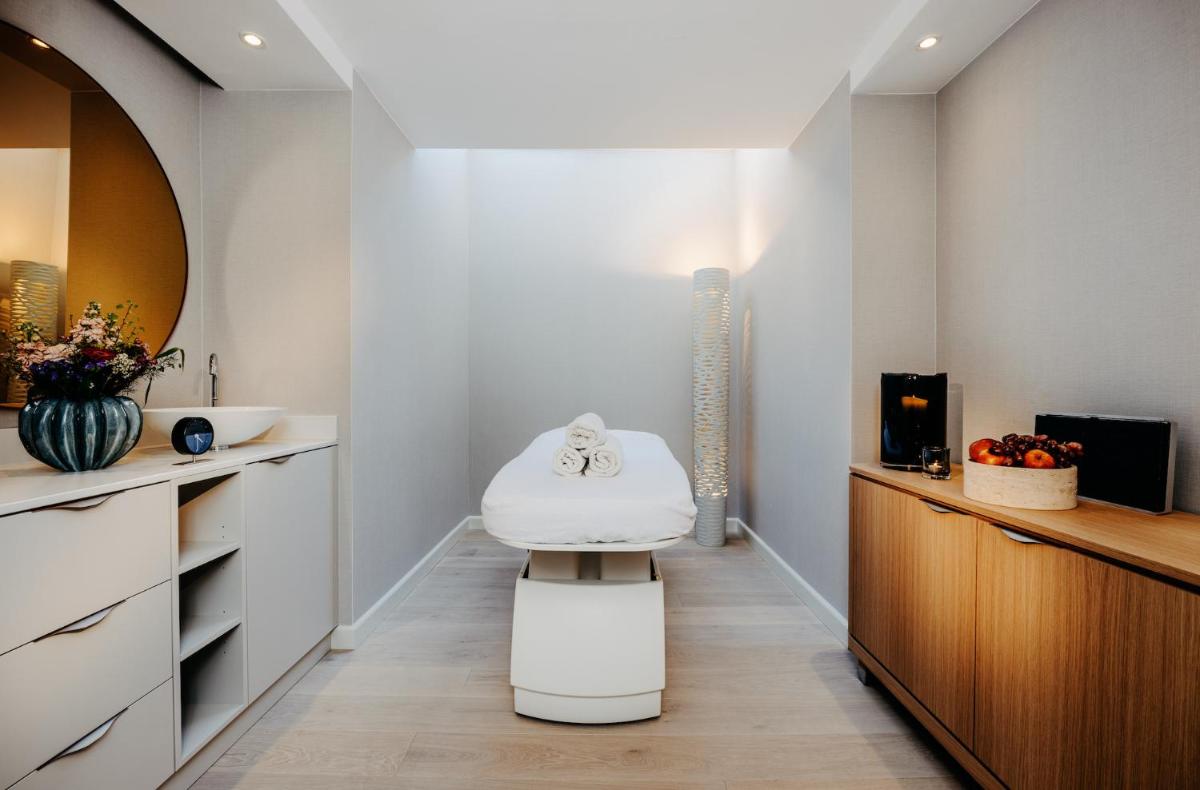 Ein Bett oder Betten in einem Zimmer der Unterkunft Söl'ring Hof