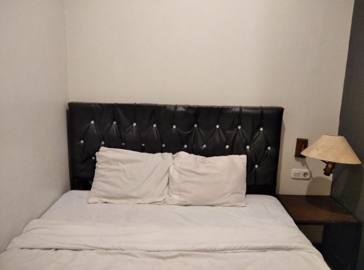 Gangnam Style Residence Mitra RedDoorz near MERR Surabaya - Housity