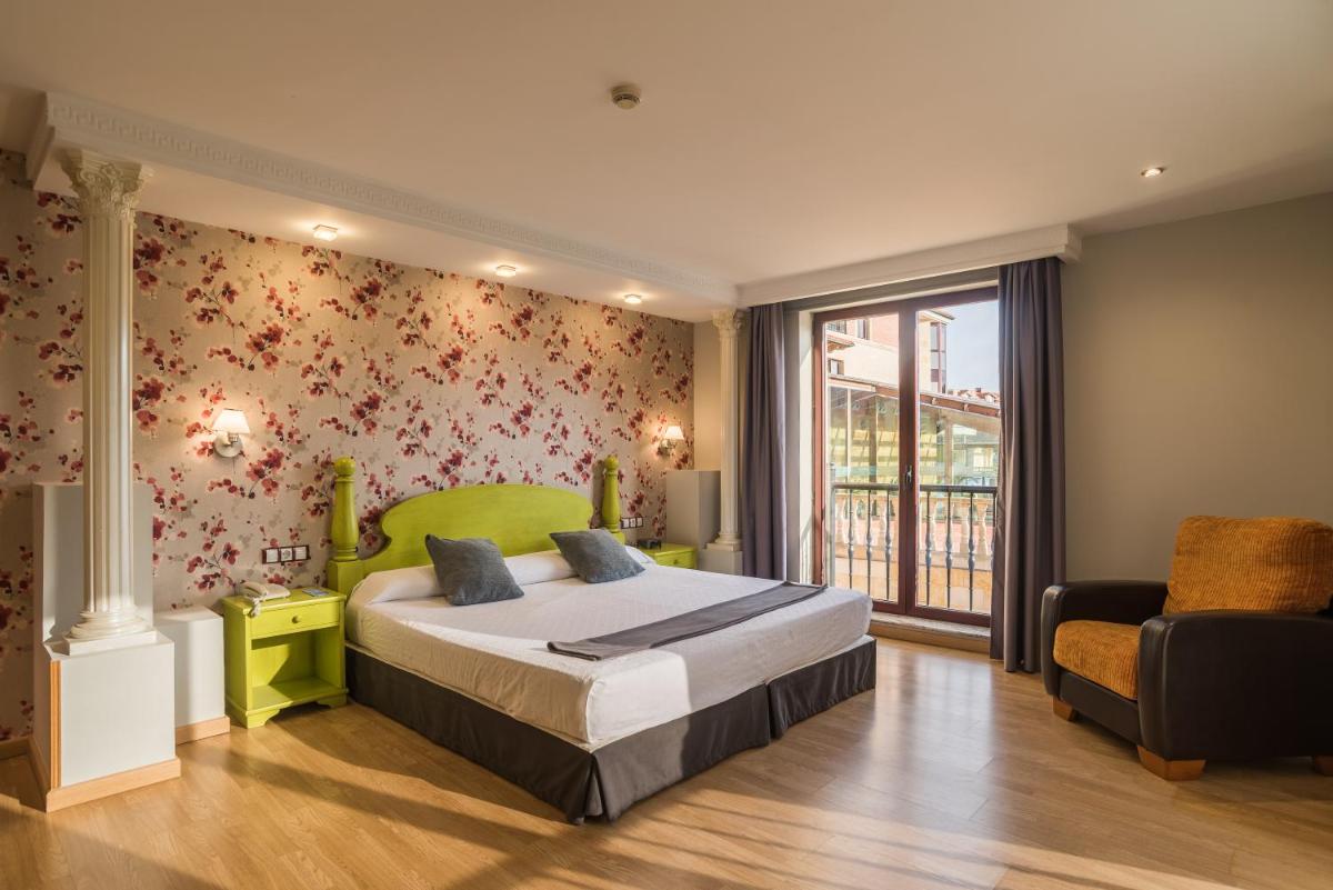 Cama o camas de una habitación en Hotel Spa Villa Pasiega