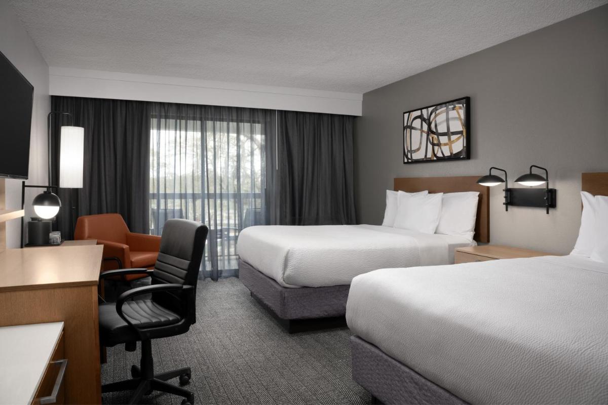 Courtyard by Marriott Orlando East/UCF Area - Housity