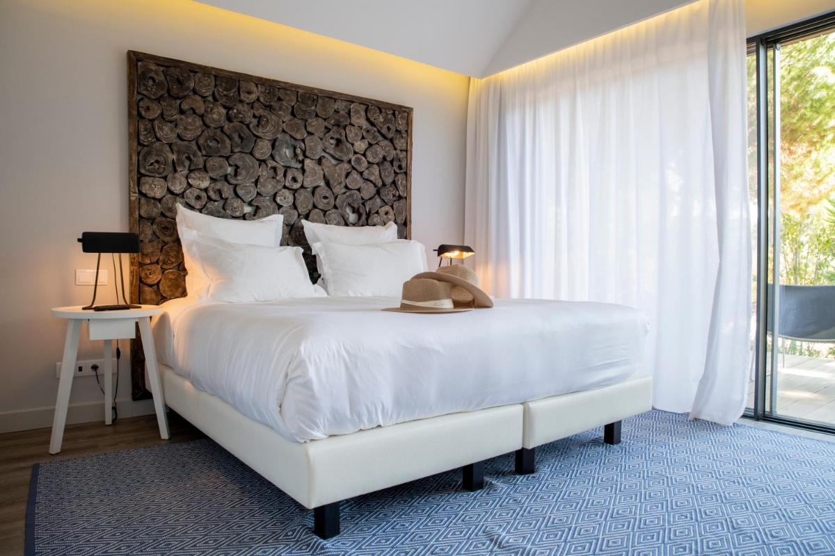 Uma cama ou camas num quarto em Sublime Comporta Country Retreat & SPA