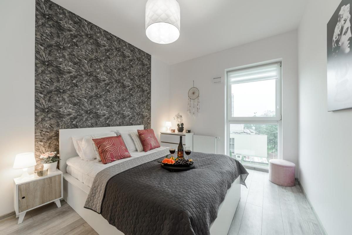 Lumina apartments with parking near Atlas Arena - Housity