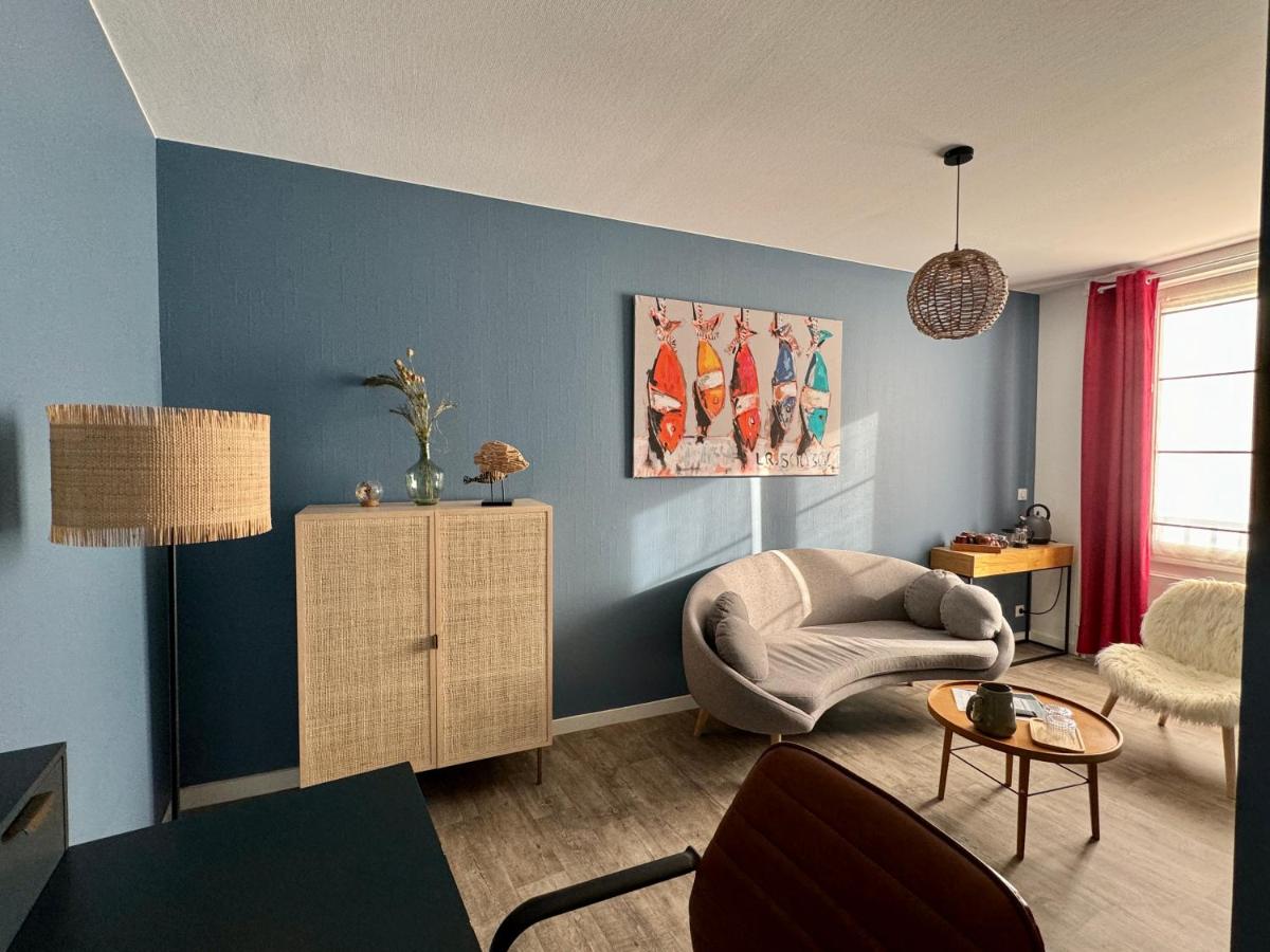 Coin salon dans l'établissement Maison des Dunes