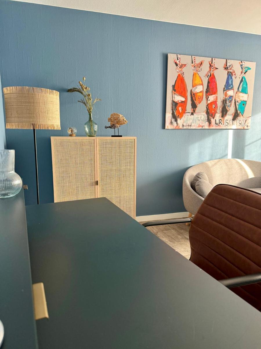Coin salon dans l'établissement Maison des Dunes
