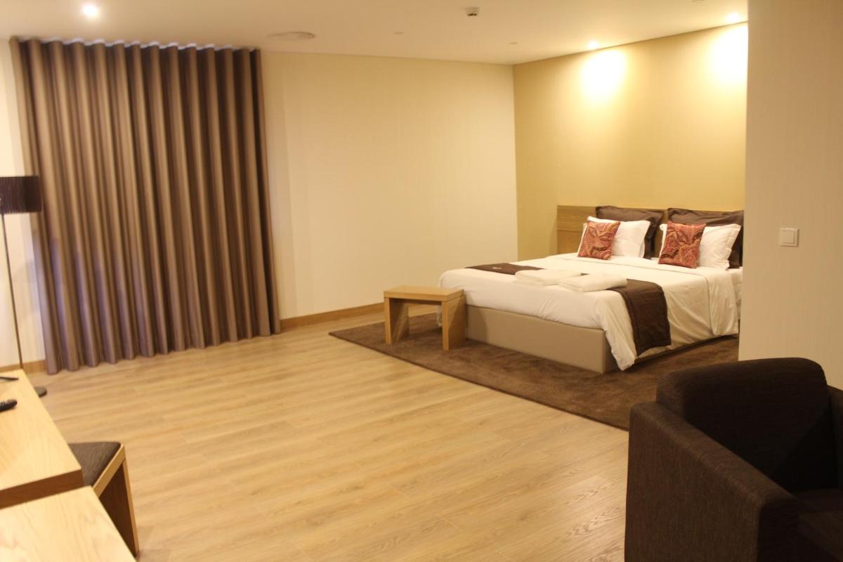 Uma cama ou camas num quarto em Douro Cister Hotel Resort