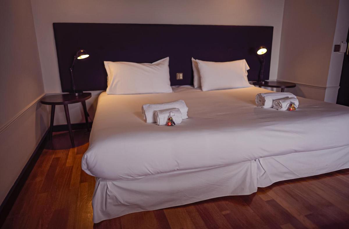 Cama o camas de una habitación en Hotel Hita "Nature Experience" for all