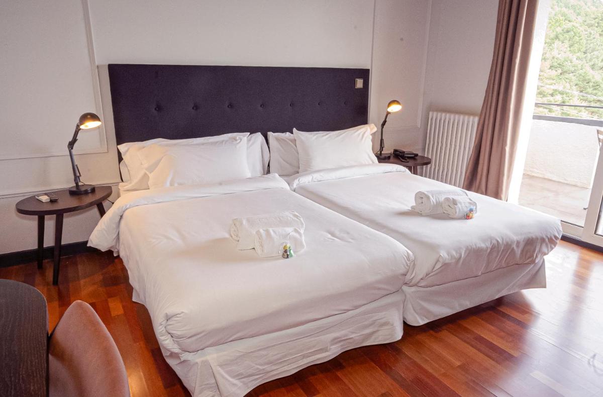 Cama o camas de una habitación en Hotel Hita "Nature Experience" for all