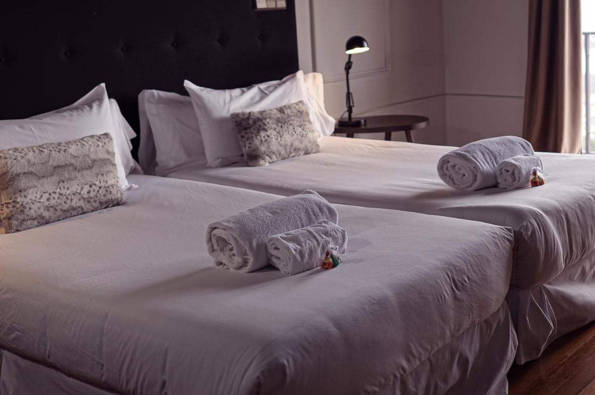 Cama o camas de una habitación en Hotel Hita "Nature Experience" for all