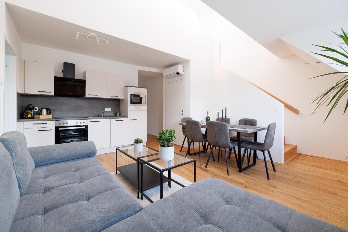 SYMPHONY Apartments 41 - Modern Loft with Terrace and Grill in Central Location - Housity