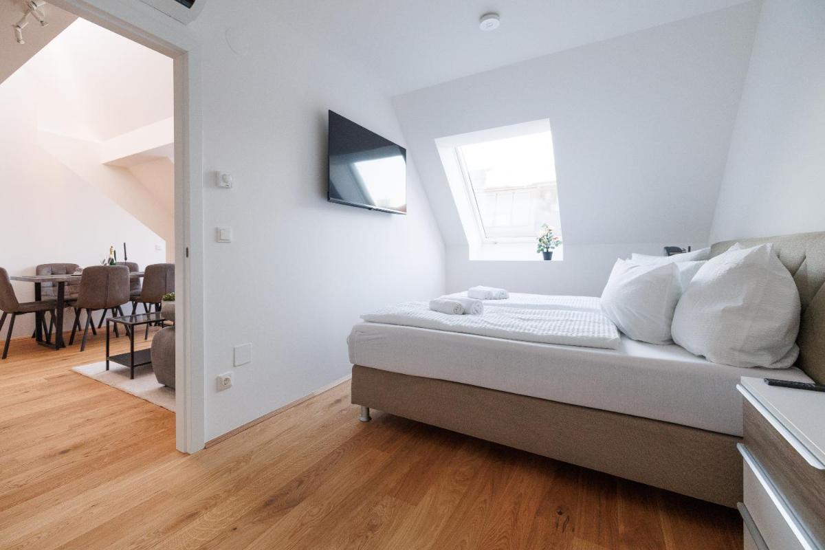 SYMPHONY Apartments 41 - Modern Loft with Terrace and Grill in Central Location - Housity